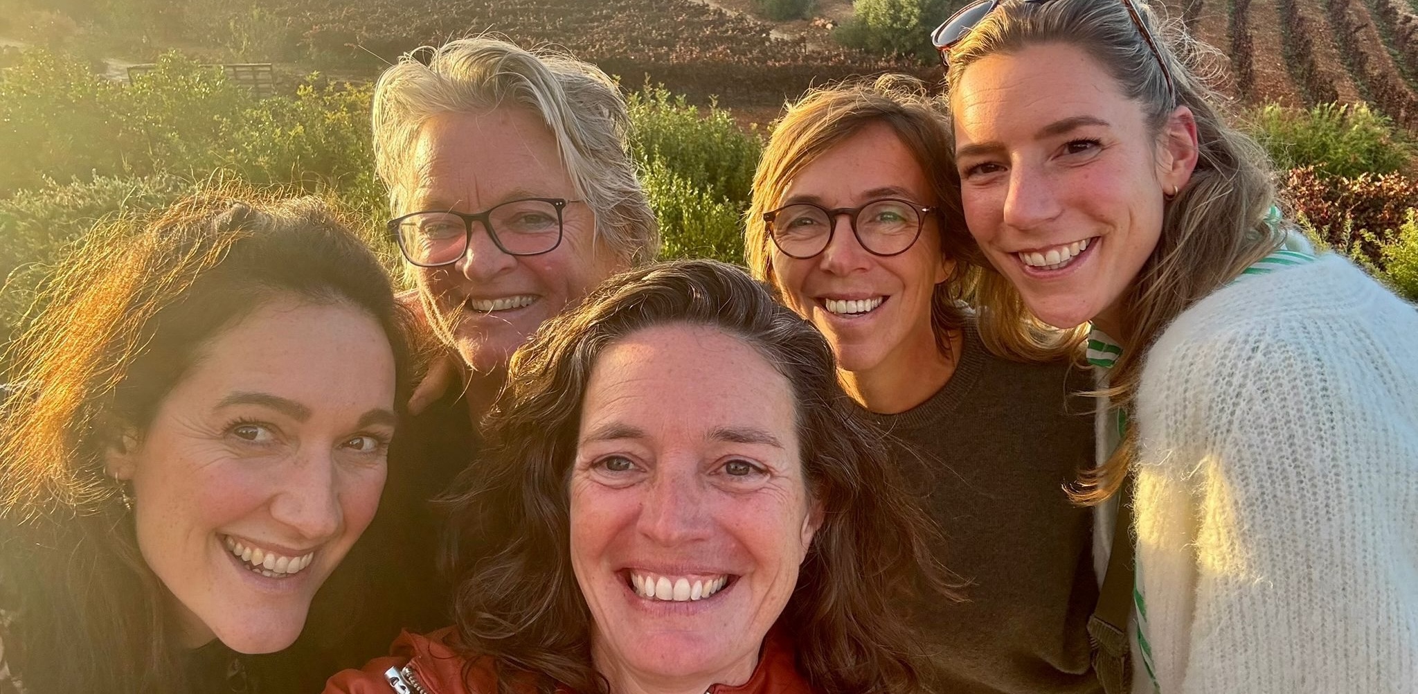 Team bij zonsondergang Portugal